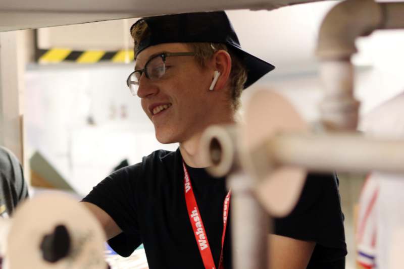 a man wearing a hat and glasses