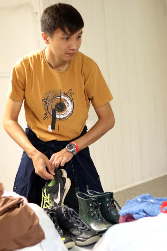 a man tying his shoes