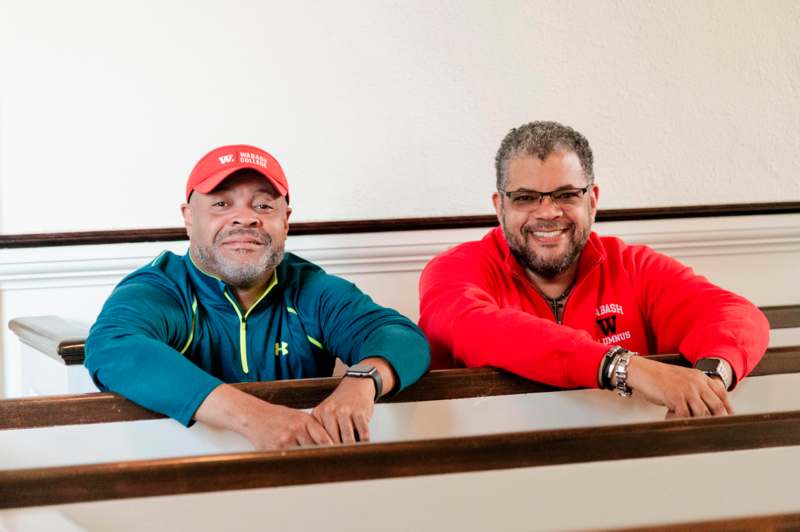 two men sitting at a table