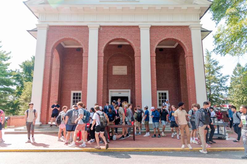 a group of people outside of a building