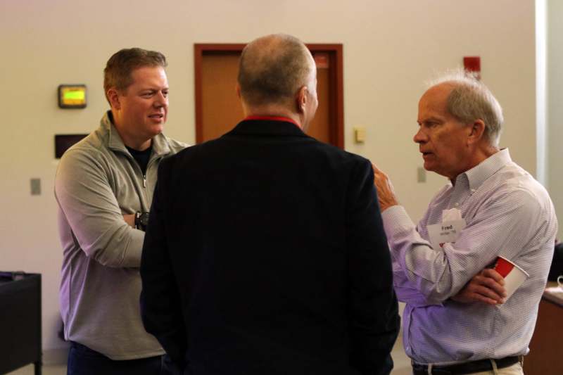 a group of men talking