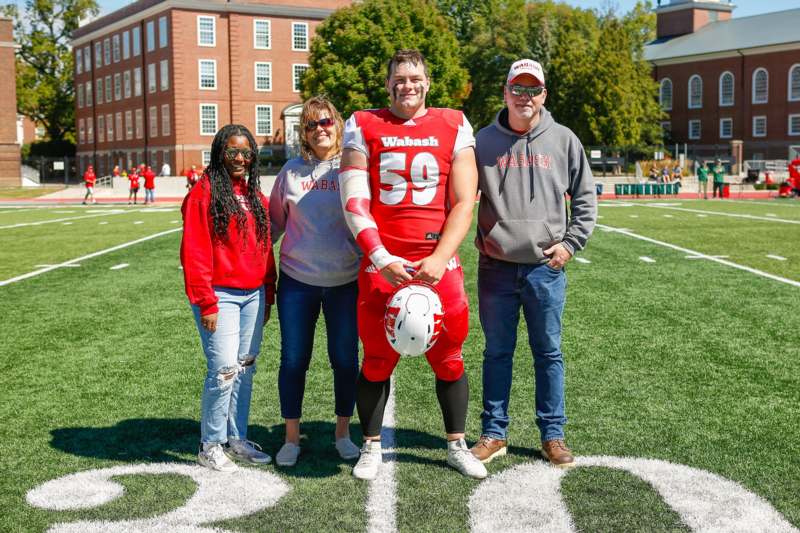 a group of people on a football field