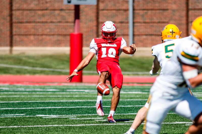 a football player running with the ball