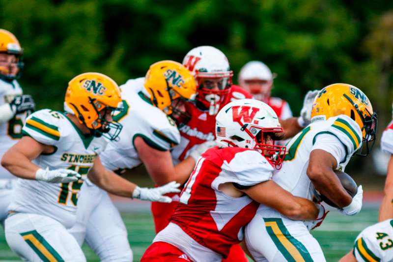 a group of football players in a game