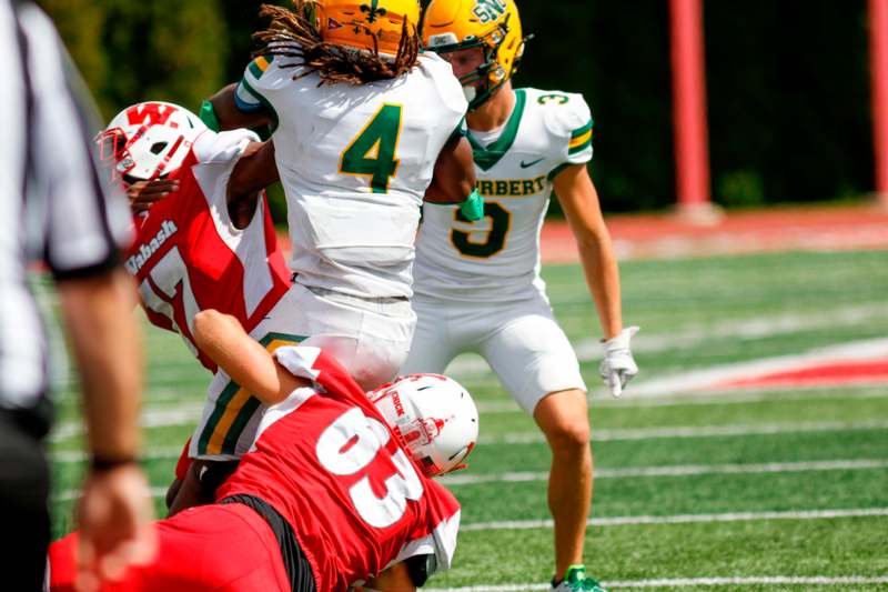 a group of football players on a field