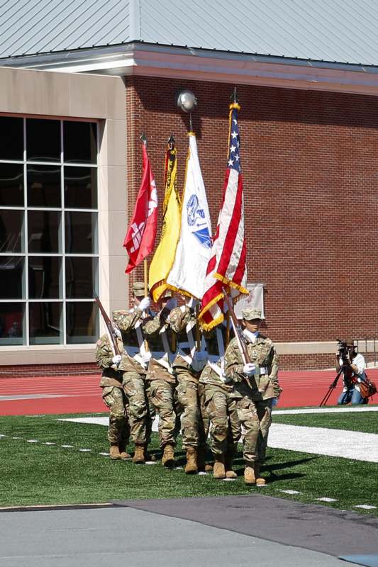 a group of soldiers holding flags