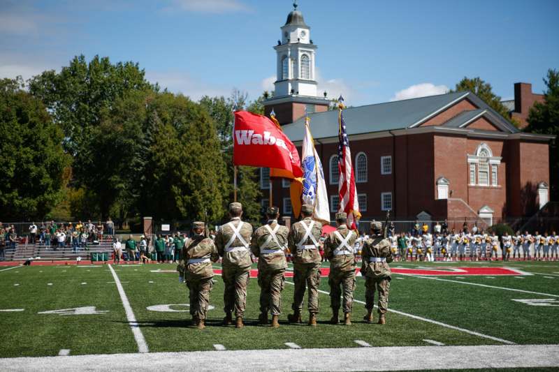 a group of soldiers on a football field