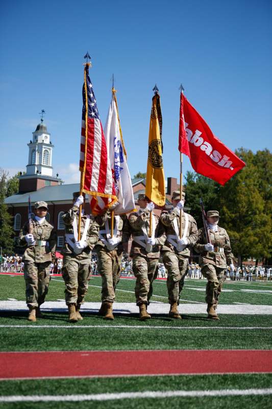 a group of soldiers holding flags