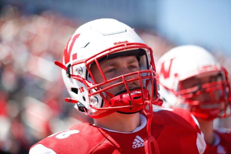 a football player wearing a helmet