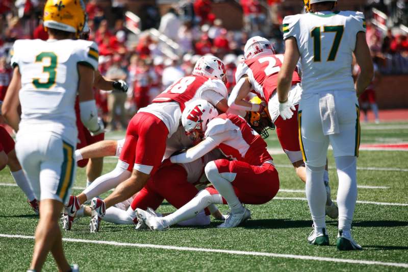 a group of football players on a field