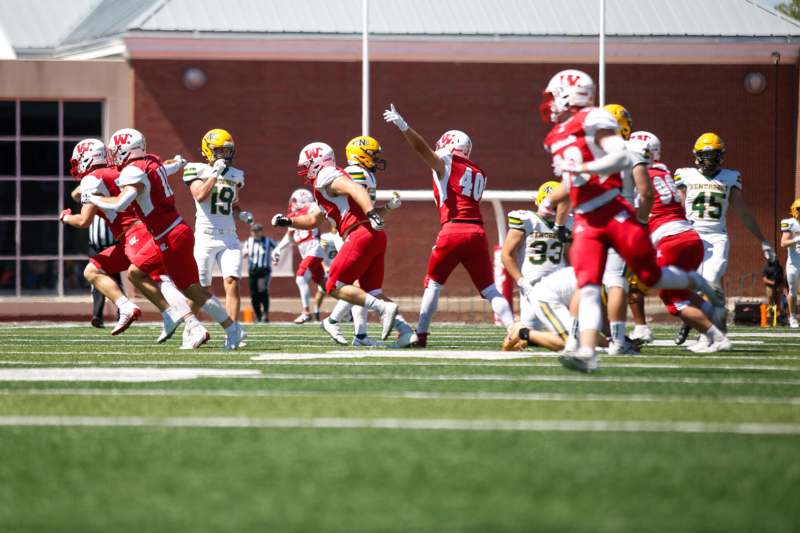 a group of football players on a field