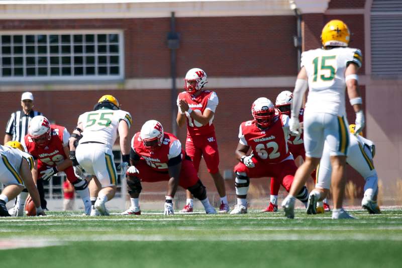 a group of football players on a field