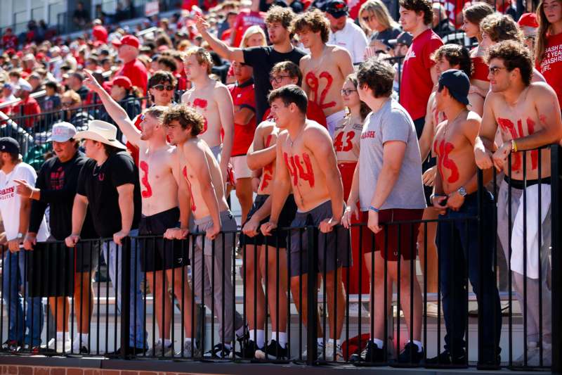 a group of people standing in a crowd