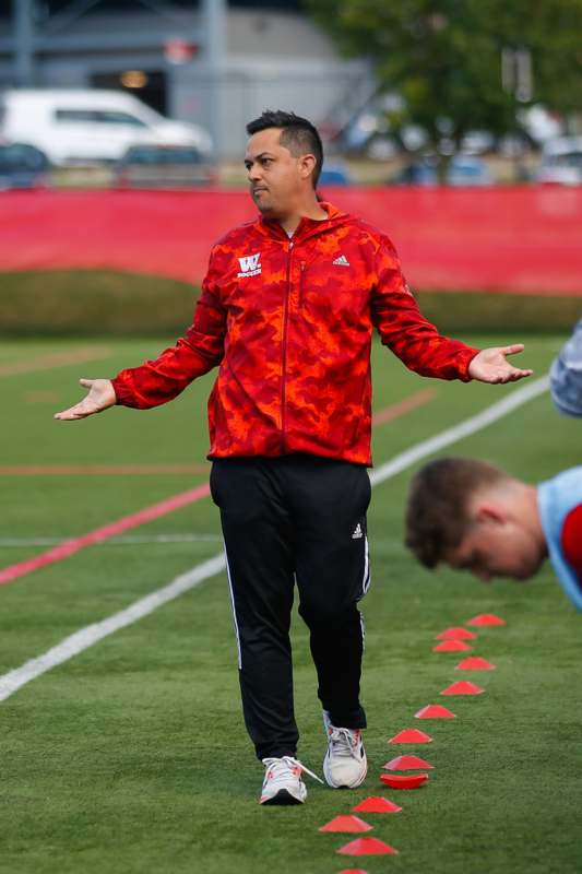 a man in a red jacket