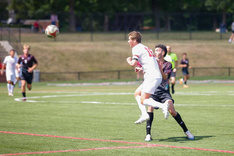 a group of men playing football