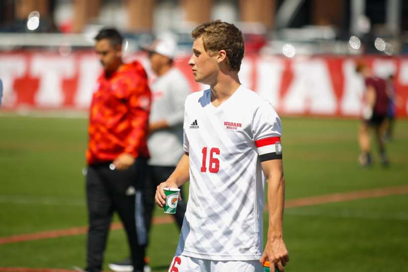 a man in a white uniform