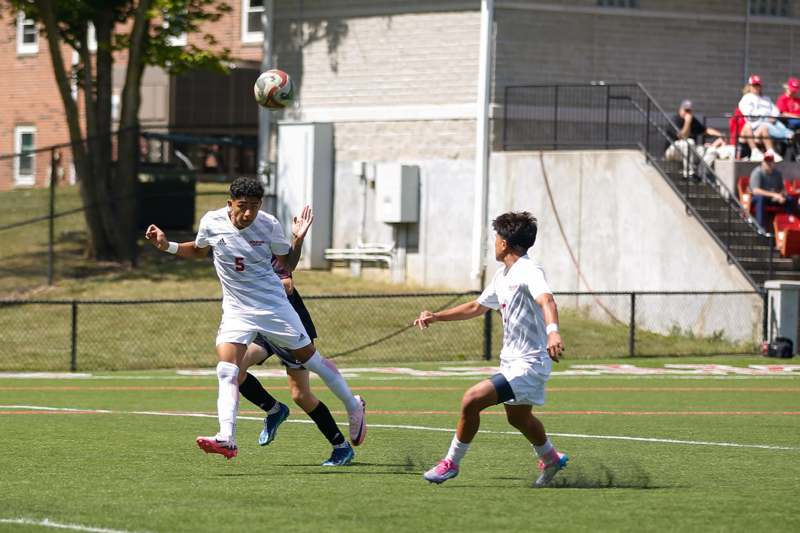 a group of people playing football