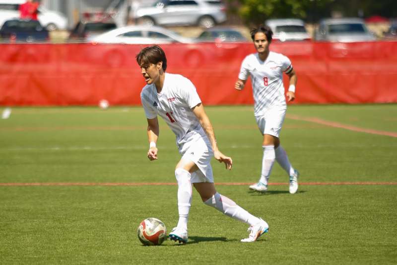 a group of men playing football