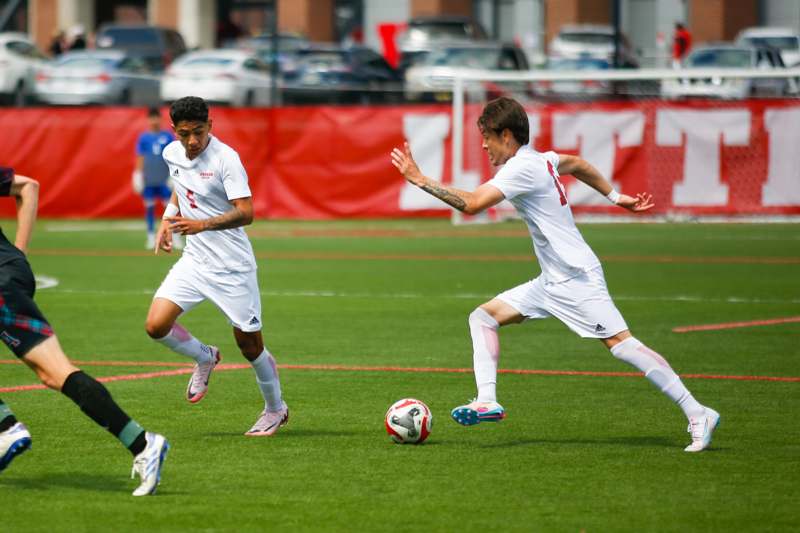 a group of men playing football