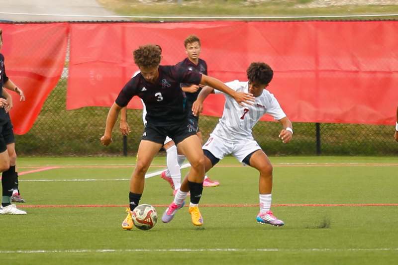 a group of men playing football