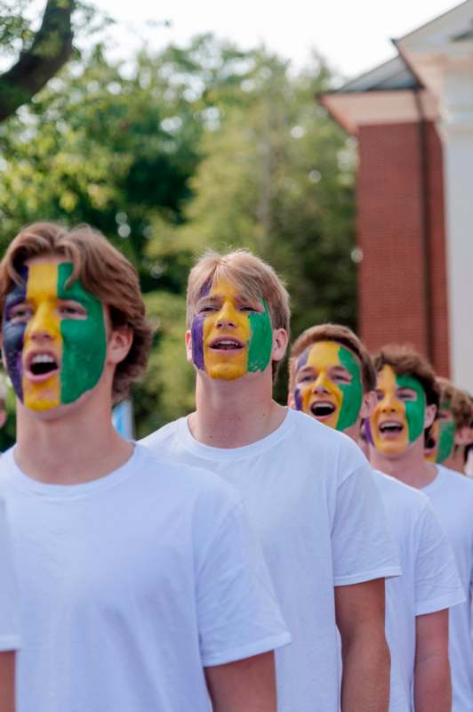 a group of people with face paint