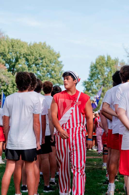 a group of people standing in a line