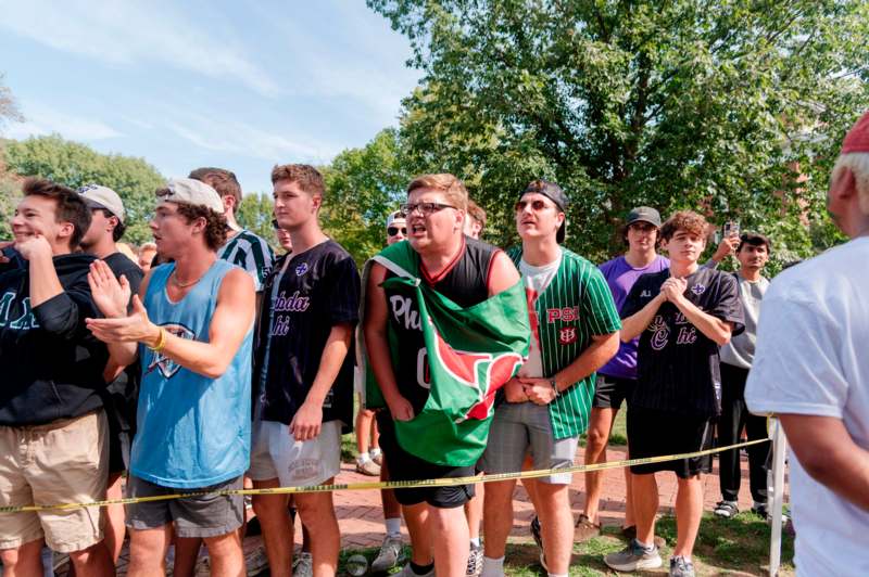 a group of people standing in a line