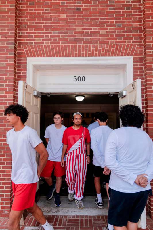 a group of people standing in a doorway