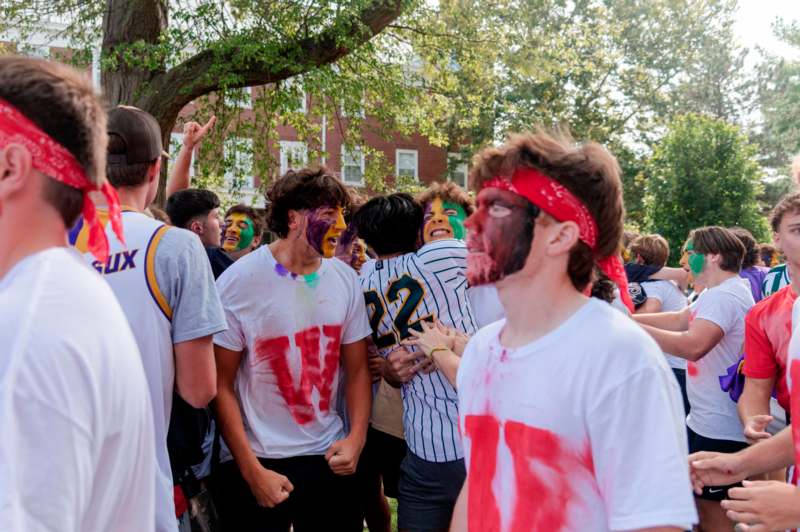 a group of people with paint on their faces