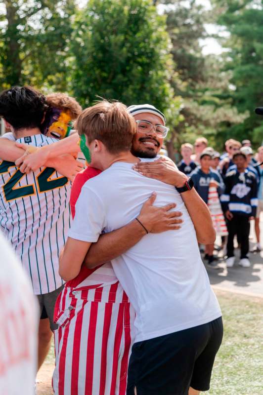 a group of people hugging