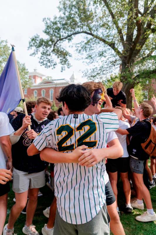 a group of people hugging each other