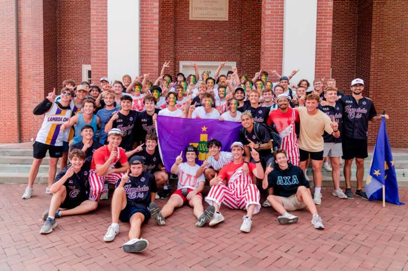 a group of people posing for a photo