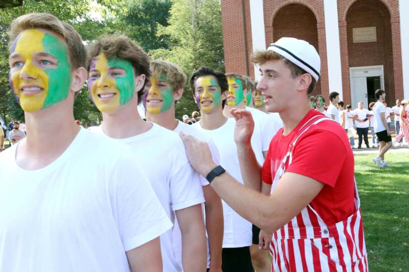 a group of people with face paint