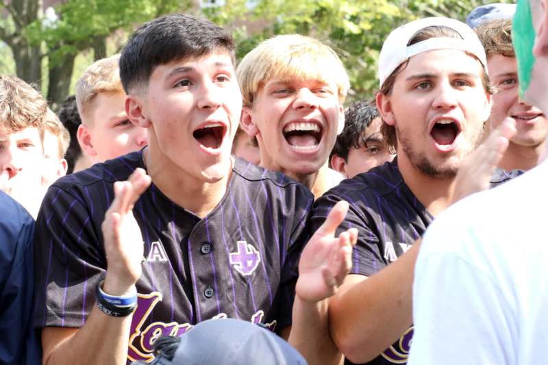 a group of people with their mouths open