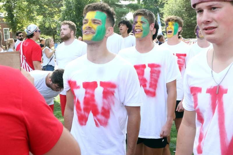 a group of people with face paint