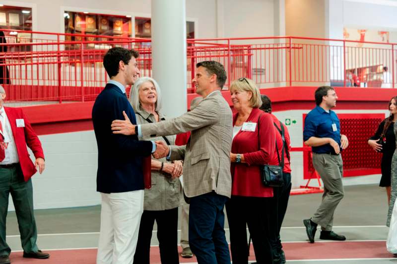 a group of people shaking hands