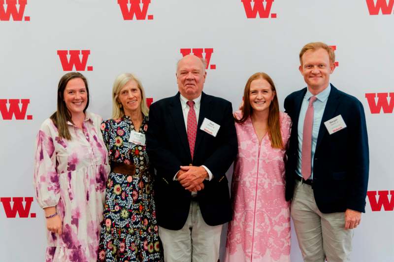 a group of people posing for a photo