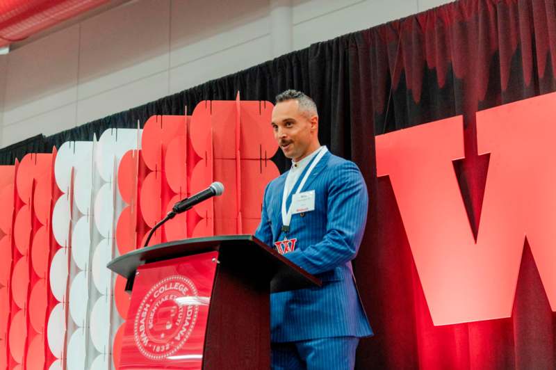 a man standing at a podium