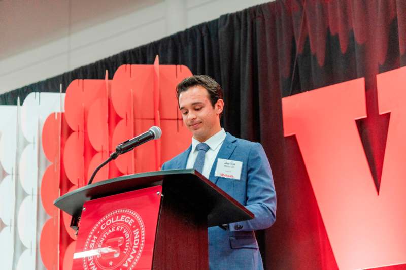 a man standing at a podium