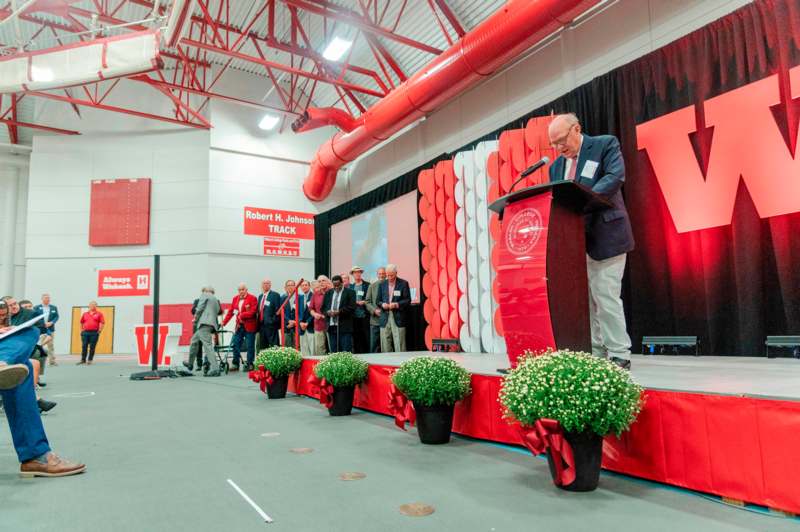 a man standing at a podium