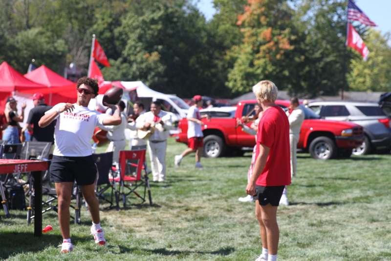 a group of people playing football