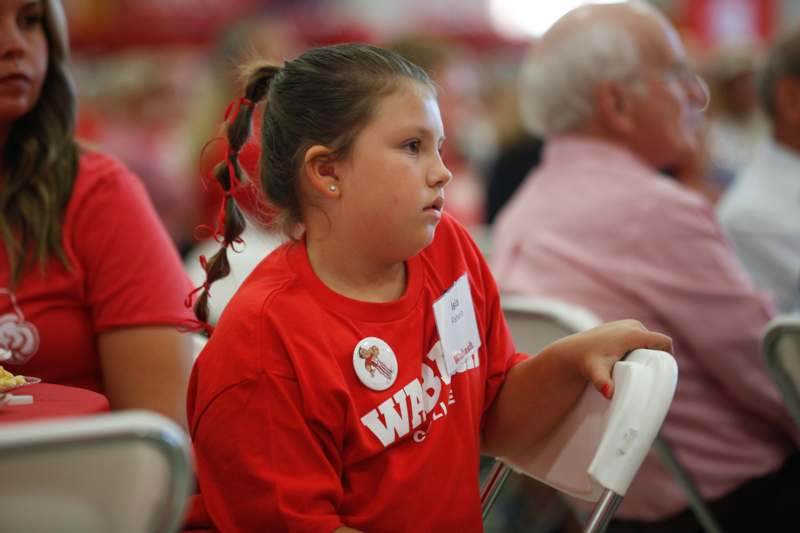 a girl in a red shirt