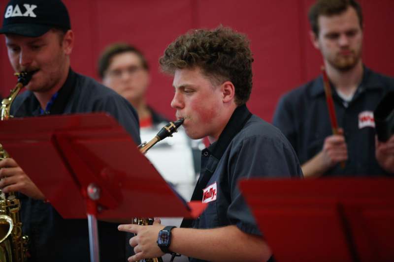 a man playing a saxophone