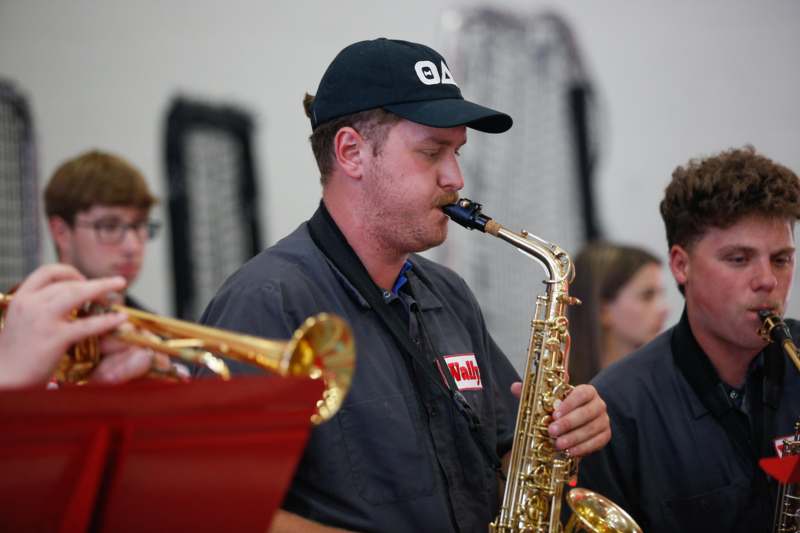 a man playing a saxophone