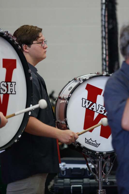 a man playing a drum