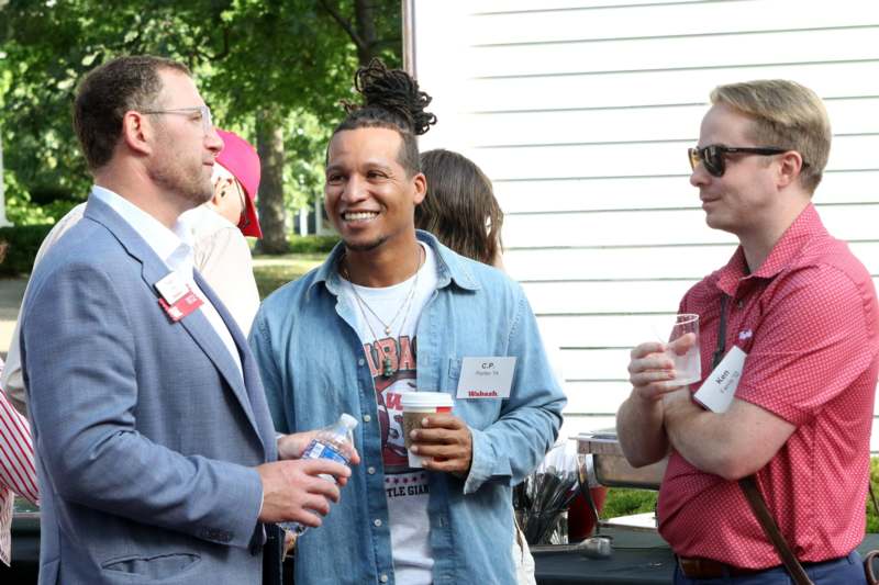 a group of men standing outside