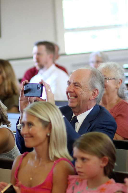 a man taking a picture of a woman