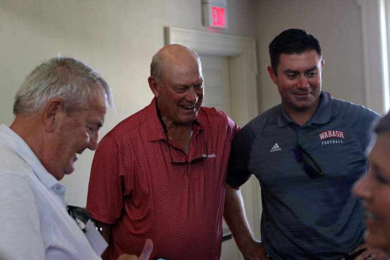 a group of men laughing