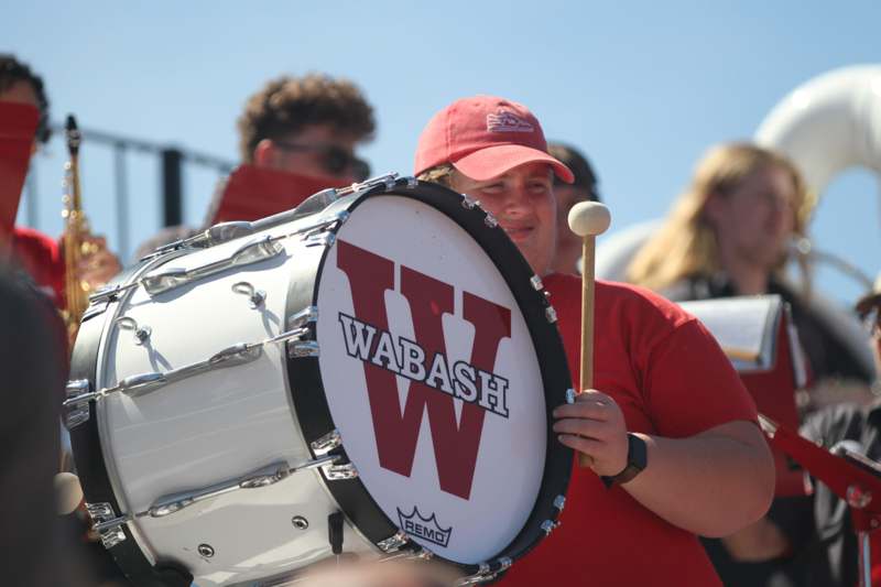 a man holding a drum