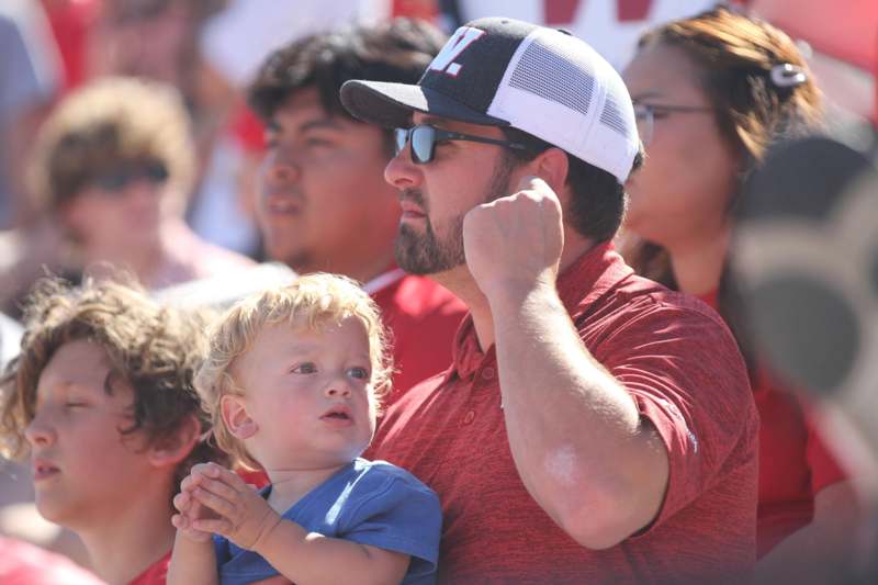 a man holding a baby